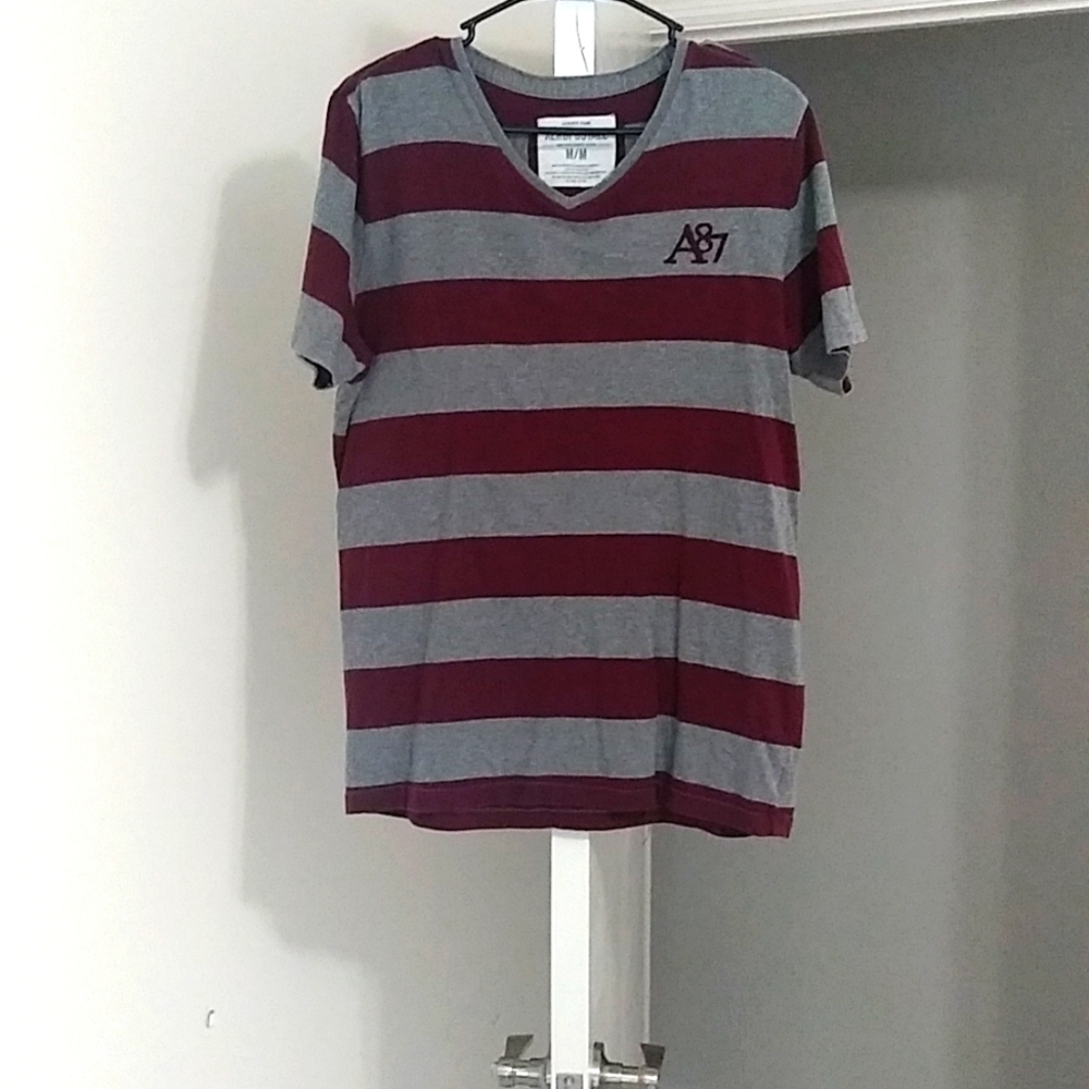 Medium, dark red and grey shirt